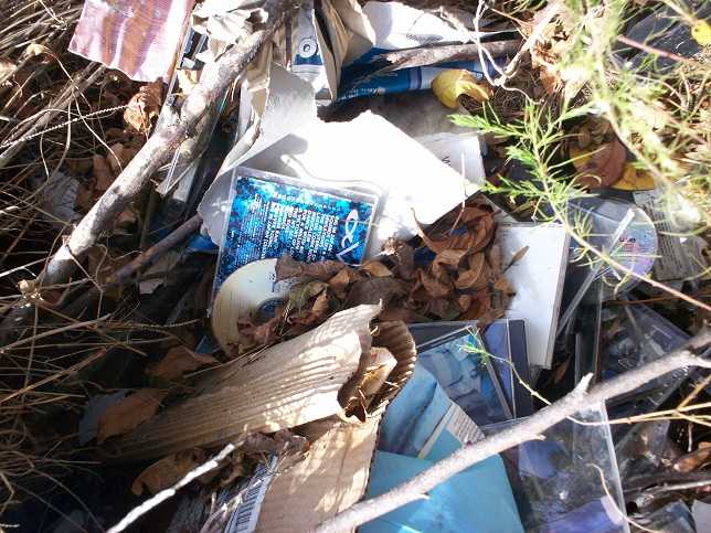 More CDs on a burnpile.